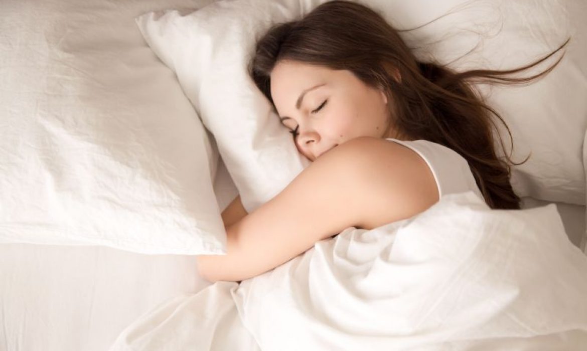 Top,View,Of,Attractive,Young,Woman,Sleeping,Well,In,Bed